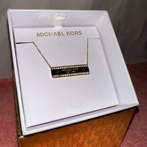 Brand New With PriceTag Authentic Michael Kors Black and Gold Pendant Necklace